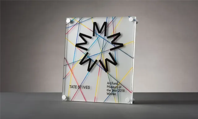 Acrylic award plaque engraved with Trotec laser cutter for Tate St Ives with colorful line design