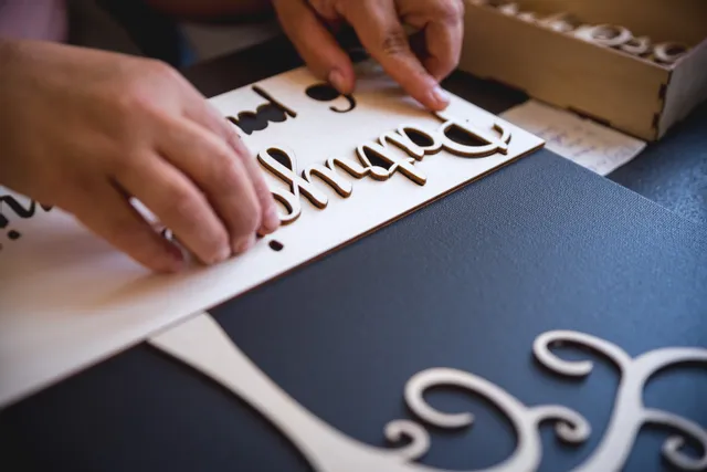 Custom wooden letters cut with Trotec CO₂ laser cutter for decorative signage