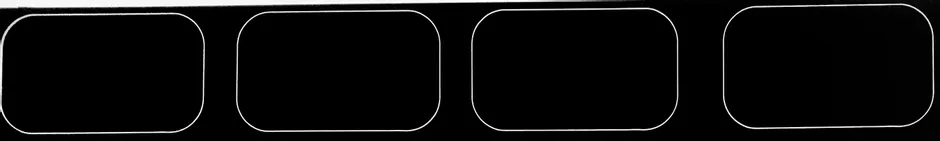 Rectangles arrondis découpés avec précision sur de l'acrylique noir à l'aide de la machine de découpe laser Trotec CO₂.