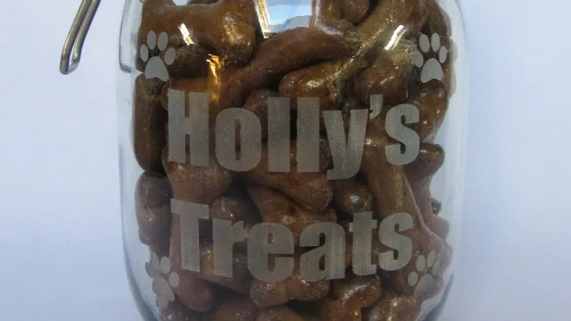 Laser-engraved glass jar labeled Holly's Treats filled with bone-shaped dog biscuits