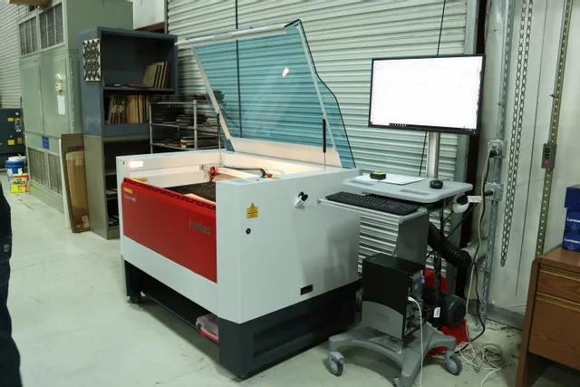 Trotec Speedy 400 CO₂ laser cutter with Ruby software setup in workshop