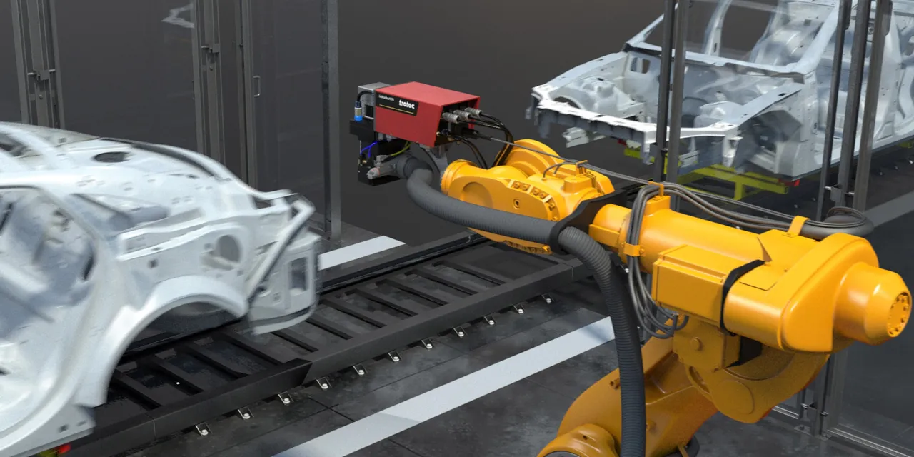 Sistema de marcado láser SpeedMarker de Trotec integrado con brazo robótico en línea de producción de automóviles