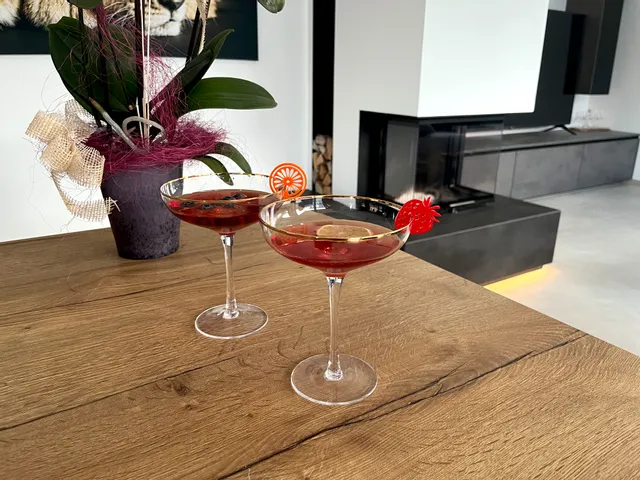 Laser-cut cocktail toppers in fruity shapes made with Trotec laser cutter on martini glasses