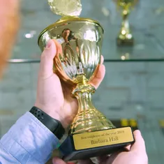 Gold trophy with laser-engraved nameplate created using Trotec laser engraving machine