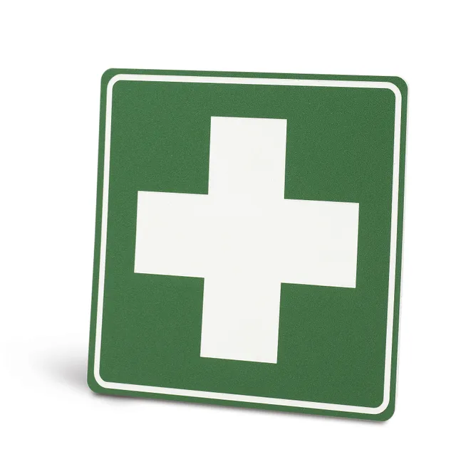 Laser-engraved first aid sign in green and white made using Trotec laser cutting technology