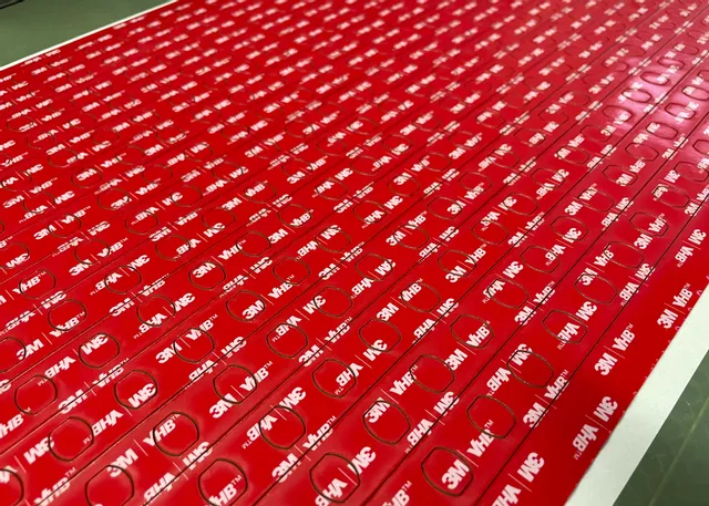 Precision-cut 3M VHB adhesive sheets with Trotec laser cutter for industrial applications