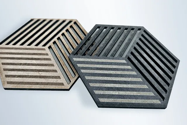 Laser-cut MDF samples with striped patterns created using Trotec CO₂ laser cutter