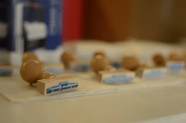 Row of custom rubber stamps potentially engraved using Trotec laser marking technology