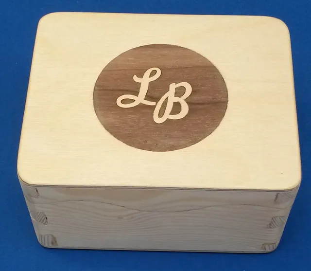 Wooden box with LB monogram laser engraved using Trotec CO₂ laser cutter