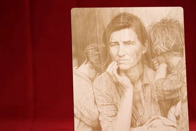 High-detail photo engraving on wood using Trotec CO₂ laser cutter