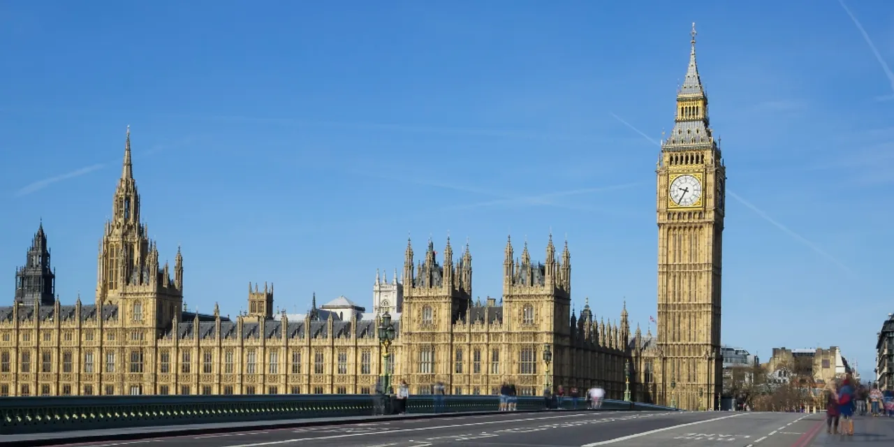 Houses of Parliament and Big Ben clock tower viewed from Westminster Bridge in London