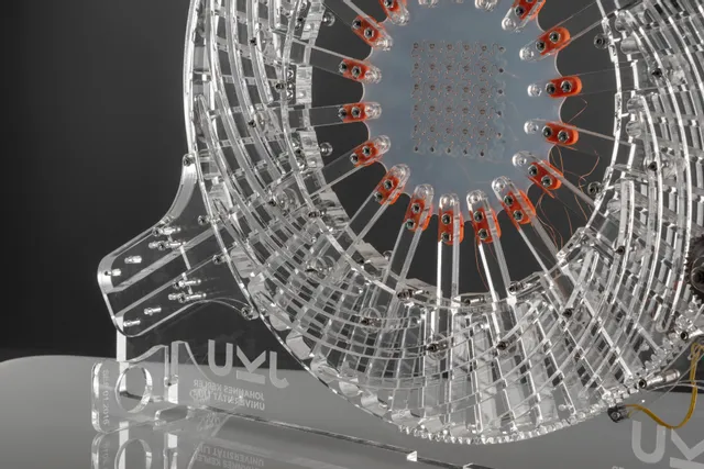 Acrylic rotor model precisely cut with Trotec laser cutter showing fine detailing and engravings