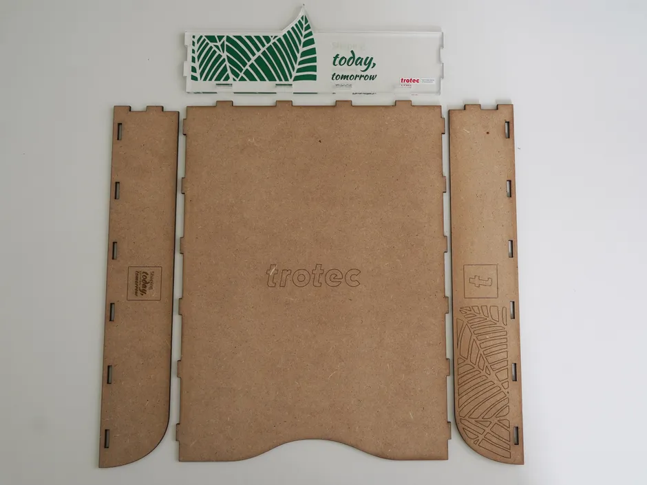 Trotec laser-cut and engraved wood kit with branding and decorative elements