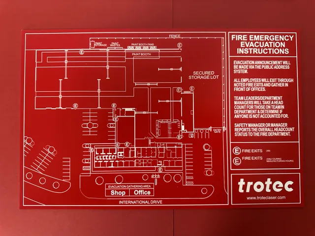 Trotec laser-engraved evacuation map and fire emergency instructions on red acrylic