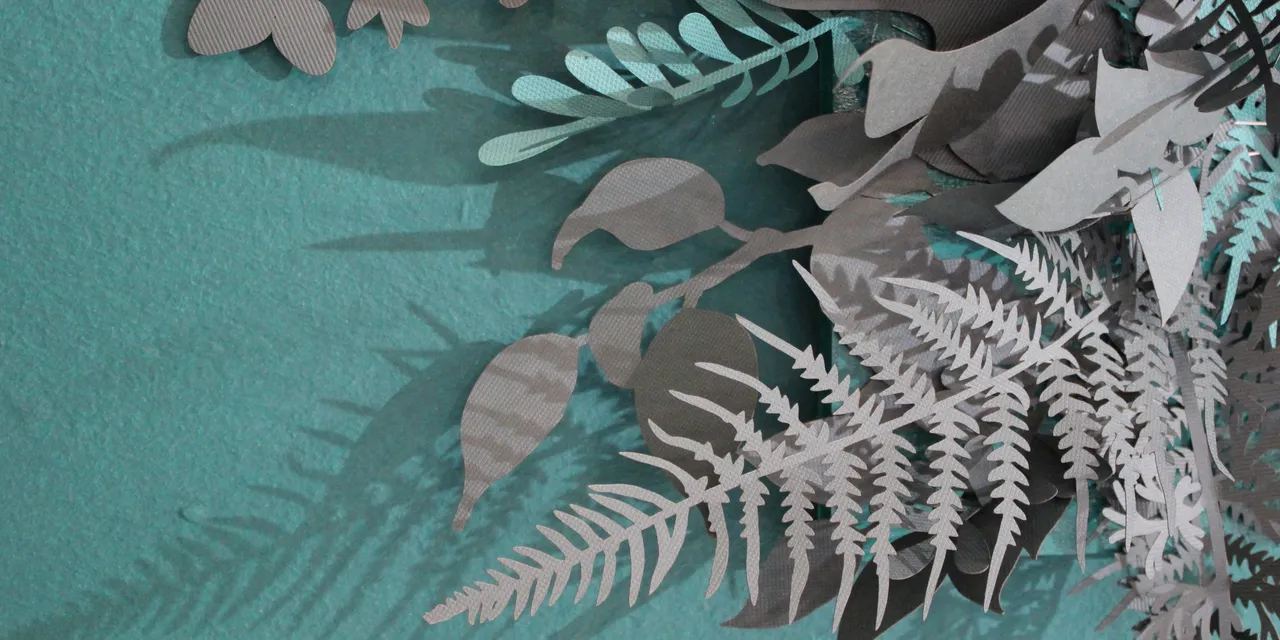 Laser-cut paper foliage design created with Trotec Speedy series laser cutter
