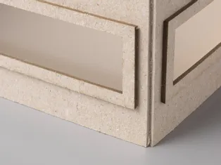 Precision-cut cardboard box corner made with Trotec CO₂ laser cutter
