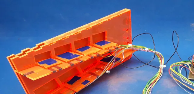 Laser-cut acrylic electronics housing with wiring, likely made using Trotec CO₂ laser cutter