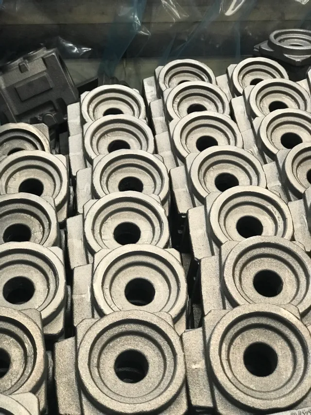 Stack of metal components ready for laser marking with Trotec SpeedMarker systems