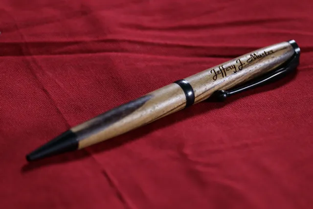 Wooden pen engraved with name using Trotec laser marking technology