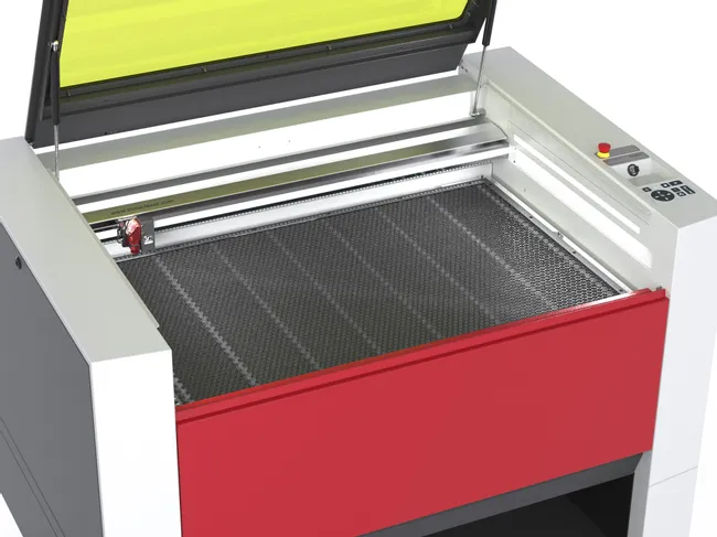 Open Trotec Speedy serie CO₂ lasersnijmachine met honingraat snijtafel en bedieningspaneel