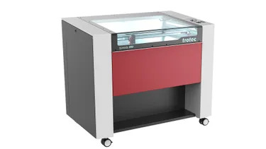 Trotec Speedy 360 CO₂ laser engraving machine with red and white housing