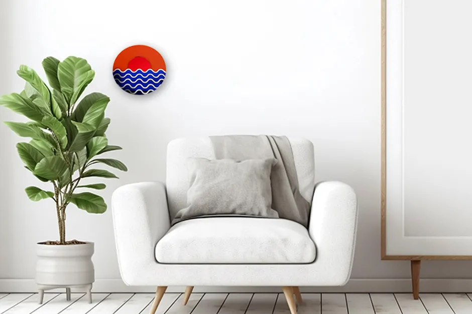 Wycinana laserowo grafika ścienna przedstawiająca zachód słońca i fale, stworzona za pomocą wycinarki laserowej Trotec CO₂.