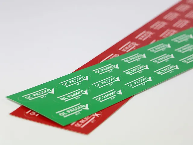 Laser-cut QC Passed stickers on colored foil made with Trotec laser engraving machine