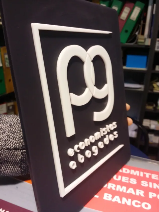 Laser-cut acrylic sign made with Trotec laser cutter for economists and lawyers office